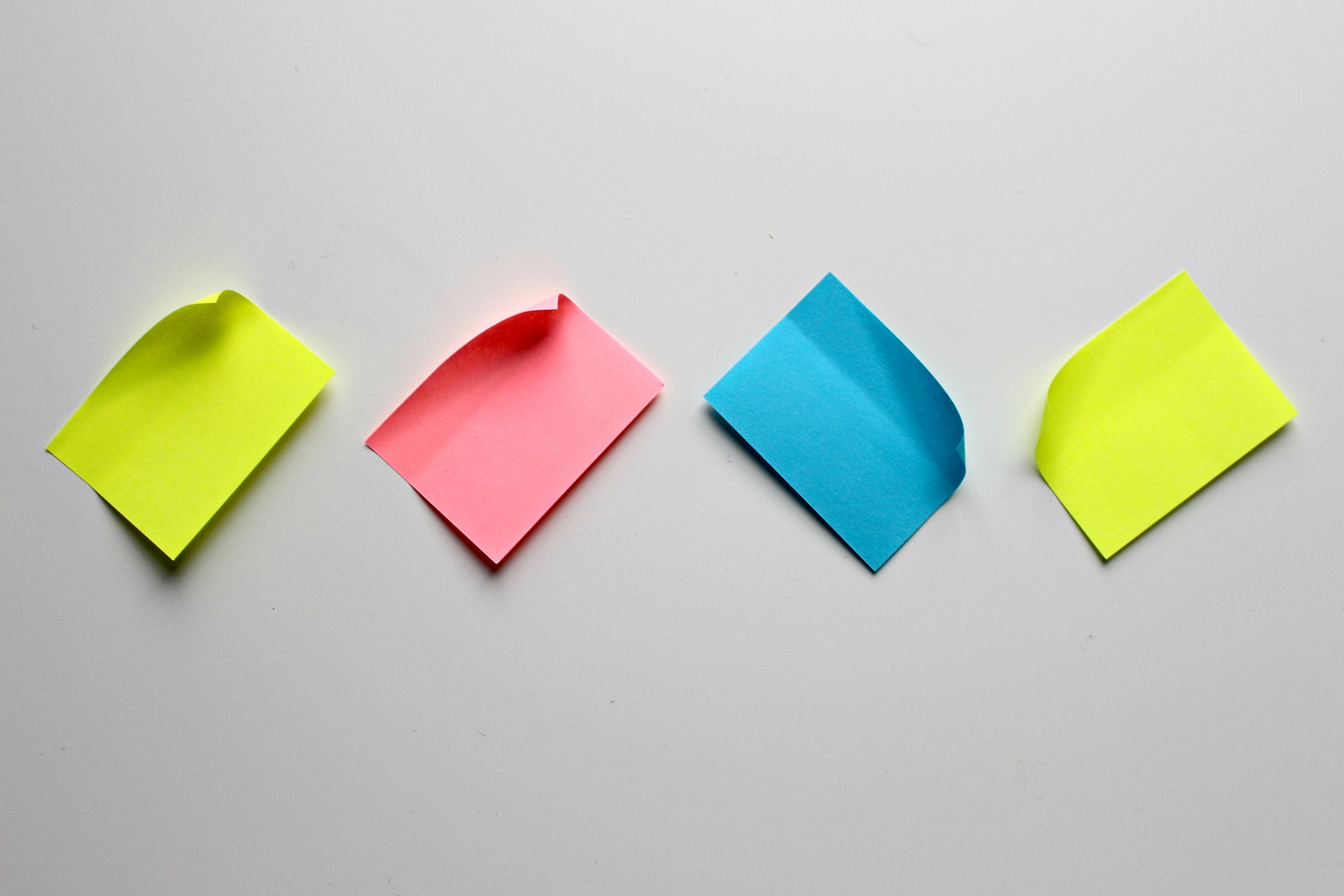 colourful sticky notes on a wall